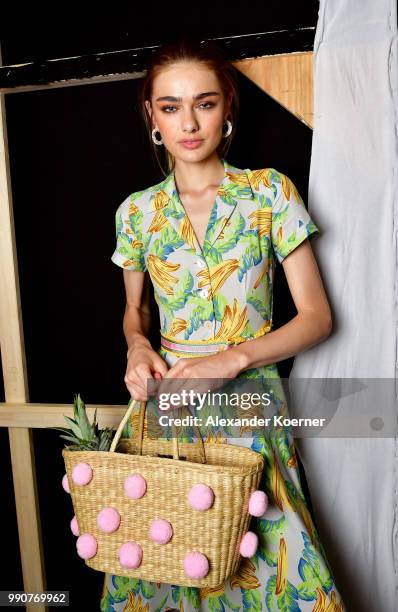 Model poses backstage ahead of the Lena Hoschek show during the Berlin Fashion Week Spring/Summer 2019 at ewerk on July 3, 2018 in Berlin, Germany.