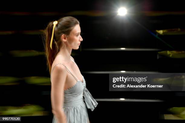 Model walks the runway ahead of the Lena Hoschek show during the Berlin Fashion Week Spring/Summer 2019 at ewerk on July 3, 2018 in Berlin, Germany.