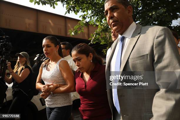 Yeni Maricela Gonzalez Garcia walks with Janey Pearl and Democratic Congressman Adriano Espaillat as she heads into a visit with her children at the...