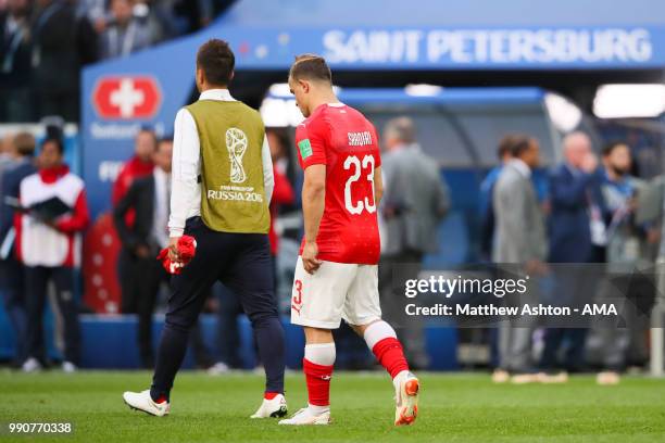 Xherdan Shaqiri of Switzerland walks off at the end of the 2018 FIFA World Cup Russia Round of 16 match between Sweden and Switzerland at Saint...