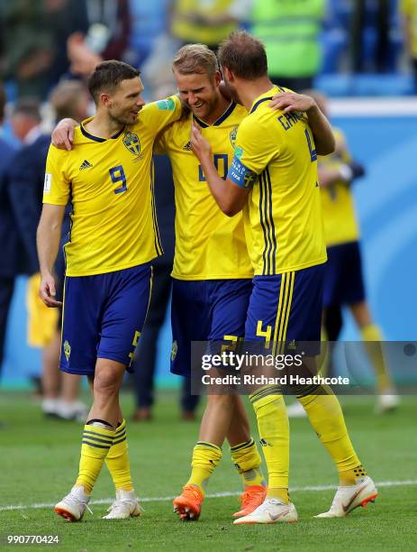 Marcus Berg of Sweden, Ola Toivonen of Sweden, and Andreas Granqvist of Sweden celebrate following their sides victory in the 2018 FIFA World Cup...
