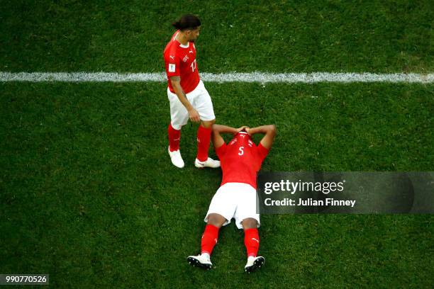 Switzerland players look dejected following their sides defeat in the 2018 FIFA World Cup Russia Round of 16 match between Sweden and Switzerlandat...