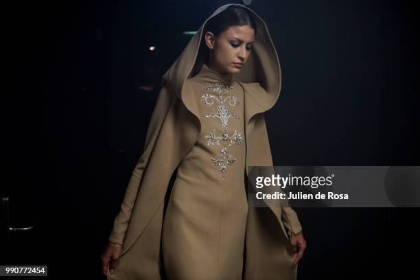 Model poses backstage prior to the Stephane Rolland Haute Couture Fall Winter 2018/2019 show as part of Paris Fashion Week on July 3, 2018 in Paris,...