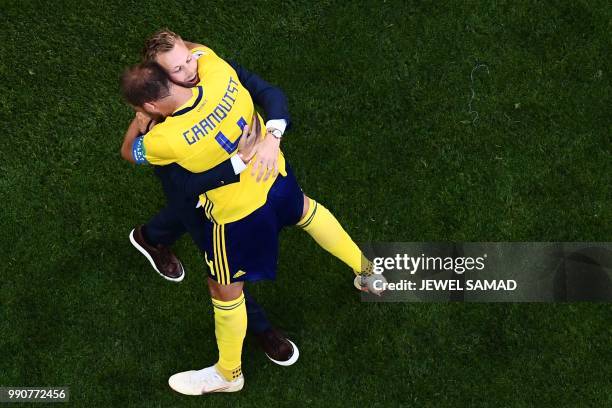 Sweden's defender Andreas Granqvist celebrates at the end of the Russia 2018 World Cup round of 16 football match between Sweden and Switzerland at...