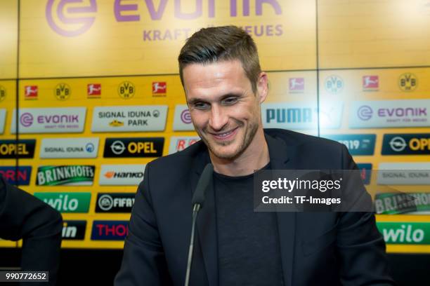 Head of the Licensing Player Department Sebastian Kehl of Dortmund laughs during the press conference on July 3, 2018 in Dortmund, Germany.