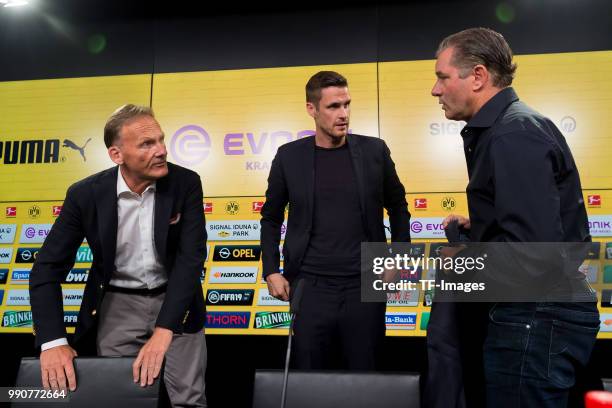 Hans-Joachim Watzke of Dortmund, Head of the Licensing Player Department Sebastian Kehl of Dortmund and Sporting director Michael Zorc of Dortmund...