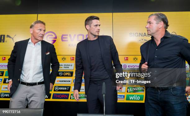 Hans-Joachim Watzke of Dortmund, Head of the Licensing Player Department Sebastian Kehl of Dortmund and Sporting director Michael Zorc of Dortmund...