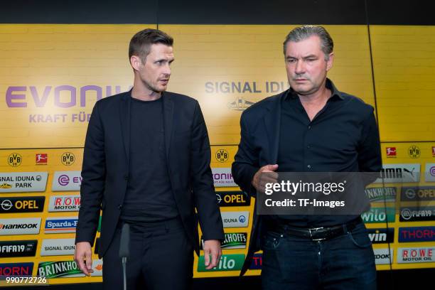 Head of the Licensing Player Department Sebastian Kehl of Dortmund and Sporting director Michael Zorc of Dortmund attend the press conference on July...