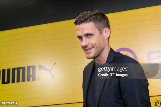 Head of the Licensing Player Department Sebastian Kehl of Dortmund laughs during the press conference on July 3, 2018 in Dortmund, Germany.