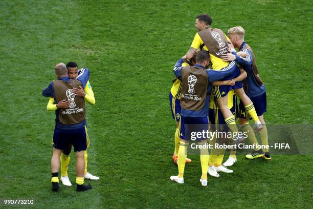 Sweden players celebrate following their sides victory in the 2018 FIFA World Cup Russia Round of 16 match between Sweden and Switzerland at Saint...