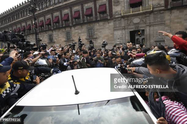 Mexican President-elect Andres Manuel Lopez Obrador arrives at the National Palace in Mexico City to hold a meeting with President Enrique Pena...