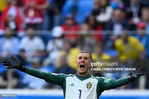 Sweden's goalkeeper Robin Olsen reacts during the Russia 2018 World Cup round of 16 football match between Sweden and Switzerland at the Saint...