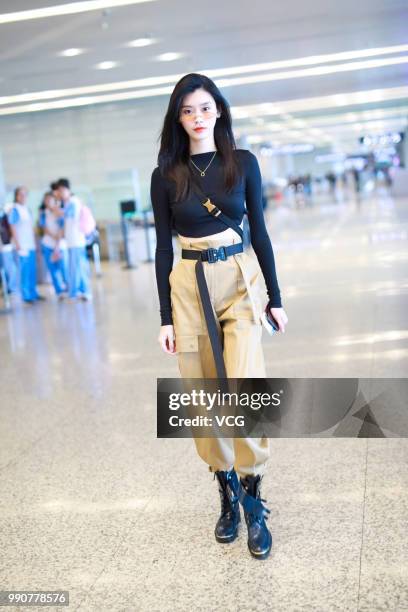 Fashion model Ming Xi Mengyao is seen at an airport on July 1, 2018 in Shanghai, China.