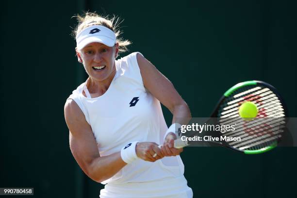 Alison Riske of The United States returns against Mariana Duque-Marino of Colombia during their Ladies' Singles first round match on day two of the...