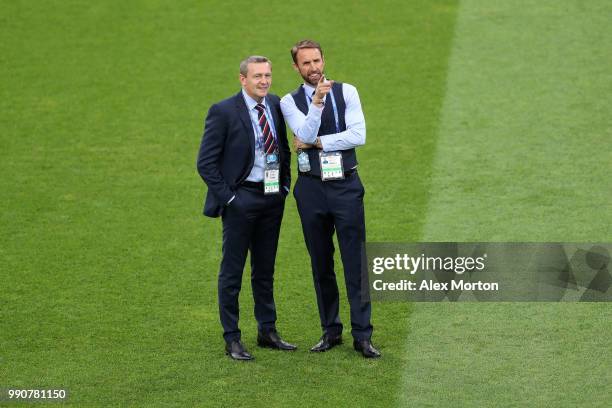 Gareth Southgate, Manager of England talks to his assistant Aidy Boothroyd during pitch inspection prior to the 2018 FIFA World Cup Russia Round of...