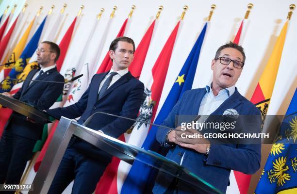 Austria's Interior Minister Herbert Kickl , Austrian Chancellor Sebastian Kurz and Austria's Vice Chancellor Heinz-Christian Strache attend a press...