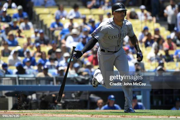 Ian Desmond of the Colorado Rockies gets a hit in the first inning against the Los Angeles Dodgers at Dodger Stadium on July 1, 2018 in Los Angeles,...