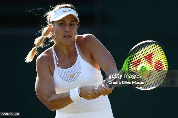 Belinda Bencic of Switzerland returns against Caroline Garcia of France during their Ladies' Singles first round match on day two of the Wimbledon...