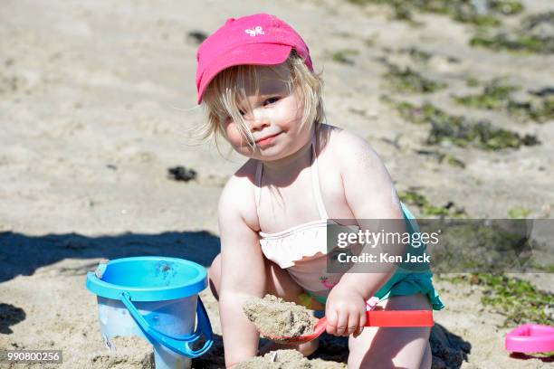 Roslyn Montague makes a sand pie on Silver Sands beach at the start of the Scottish school holidays as the heatwave continues, on July 3, 2018 in...