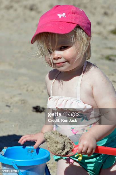 Roslyn Montague makes a sand pie on Silver Sands beach at the start of the Scottish school holidays as the heatwave continues, on July 3, 2018 in...