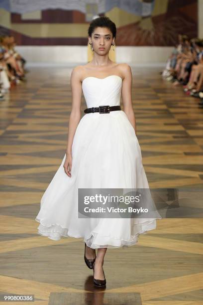 Model walks the runway during the Ulyana Sergeenko Haute Couture Fall Winter 2018/2019 show as part of Paris Fashion Week on July 3, 2018 in Paris,...