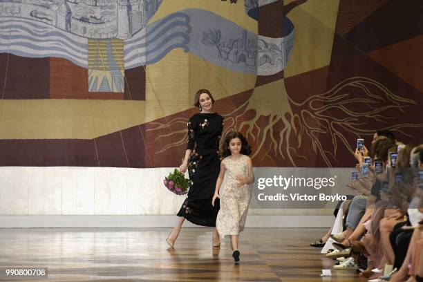 Ulyana Sergeenko is applauded on the runway during the Ulyana Sergeenko Haute Couture Fall Winter 2018/2019 show as part of Paris Fashion Week on...