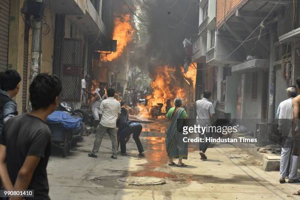 Fire broke out in a building in Bazar Lane, Bhogal, on July 3, 2018 in New Delhi, India.