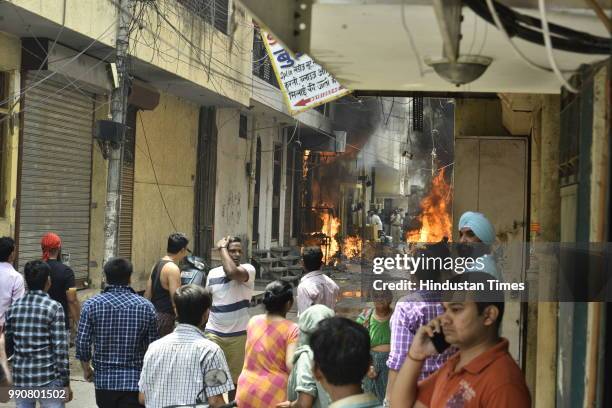 Fire broke out in a building in Bazar Lane, Bhogal, on July 3, 2018 in New Delhi, India.