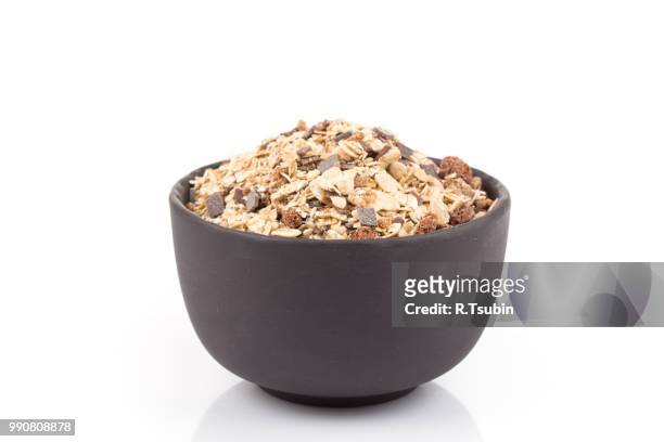 healthy oat granola muesli cereals with chocolate in a bowl on white - chocolate flake bildbanksfoton och bilder