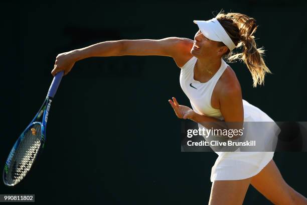 Maria Sharapova of Russia serves against Vitalia Diatchenko of Russia during their Ladies' Singles first round match on day two of the Wimbledon Lawn...