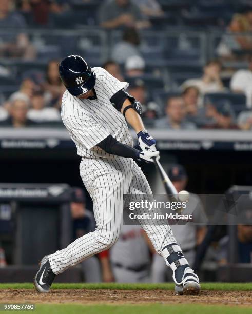 Kyle Higashioka of the New York Yankees connects on a fourth inning home run against the Boston Red Sox at Yankee Stadium on July 1, 2018 in the...