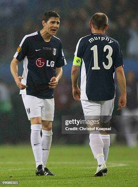 Zoltan Gera and Danny Murphy of Fulham react during the UEFA Europa League final match between Atletico Madrid and Fulham at HSH Nordbank Arena on...