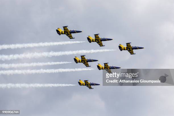Six L-39C Albatros trainer aircrafts of the Baltic Bees Jet Team perform an aerobatic display during the Kavala Air Sea Show on June 30, 2018 in...