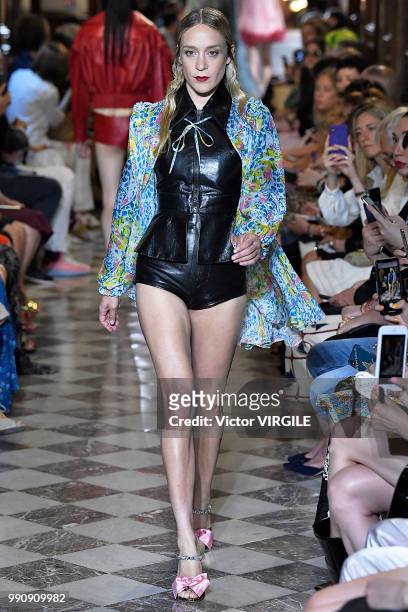 Chloe Sevigny walks the runway during the finale of the Miu Miu 2019 Cruise Collection Show at Hotel Regina on June 30, 2018 in Paris, France.