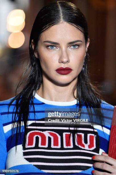 Adriana Lima walks the runway during the finale of the Miu Miu 2019 Cruise Collection Show at Hotel Regina on June 30, 2018 in Paris, France.