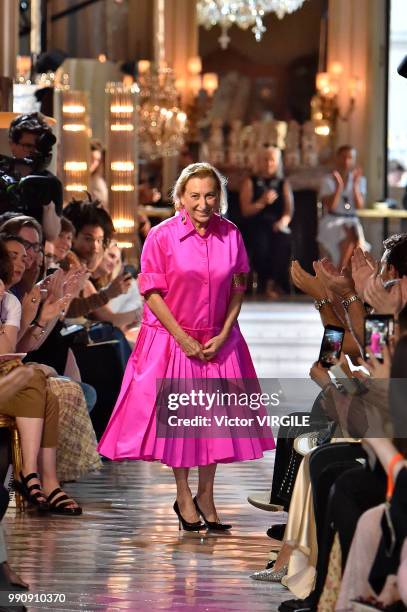 Miuccia Prada walks the runway during the finale of the Miu Miu 2019 Cruise Collection Show at Hotel Regina on June 30, 2018 in Paris, France.