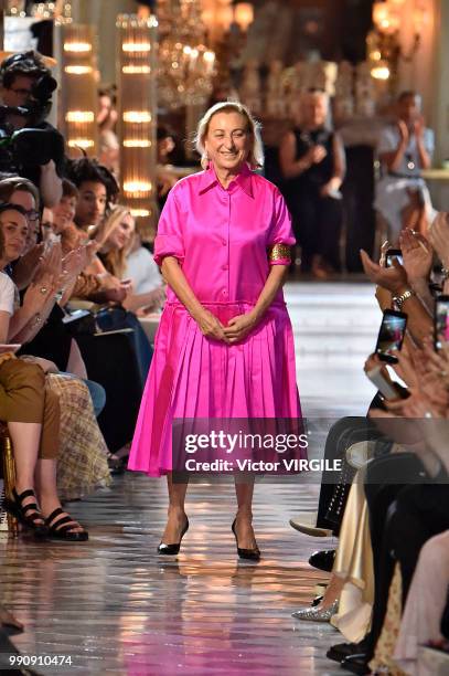 Miuccia Prada walks the runway during the finale of the Miu Miu 2019 Cruise Collection Show at Hotel Regina on June 30, 2018 in Paris, France.