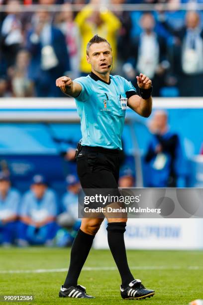 Refeeree Damir Skomina of Slovenia gestures during the 2018 FIFA World Cup Russia Round of 16 match between Sweden and Switzerland at Saint...