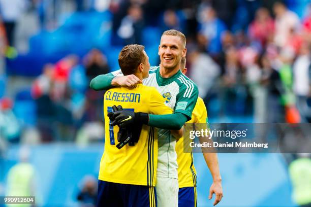 Viktor Claesson of Sweden gives goalkeeper Robin Olsen of Sweden a hug after the 2018 FIFA World Cup Russia Round of 16 match between Sweden and...