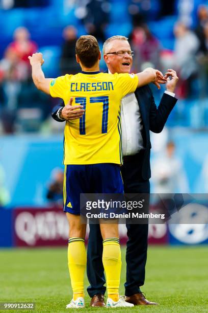 Viktor Claesson of Sweden gives coach Janne Andersson of Sweden a hug after the 2018 FIFA World Cup Russia Round of 16 match between Sweden and...