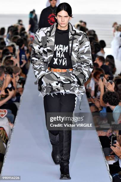 Model walks the runway during the Vetements Ready to Wear Spring/Summer 2019 fashion show as part of Paris Fashion Week on July 1, 2018 in Paris,...