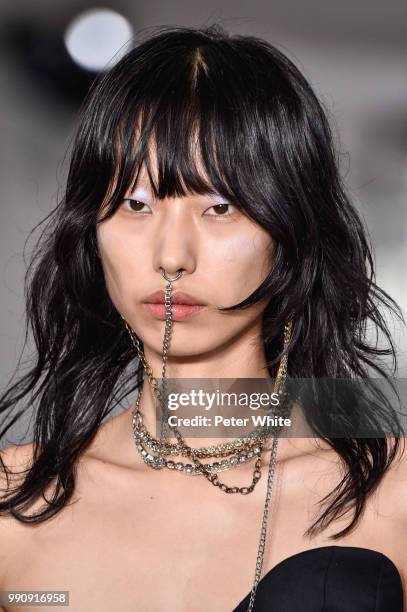 Hee Jeung Park walks the runway during the Acne Studios Womenswear Spring Summer 2019 show during the Paris Fashion Week on July 1, 2018 in Paris,...