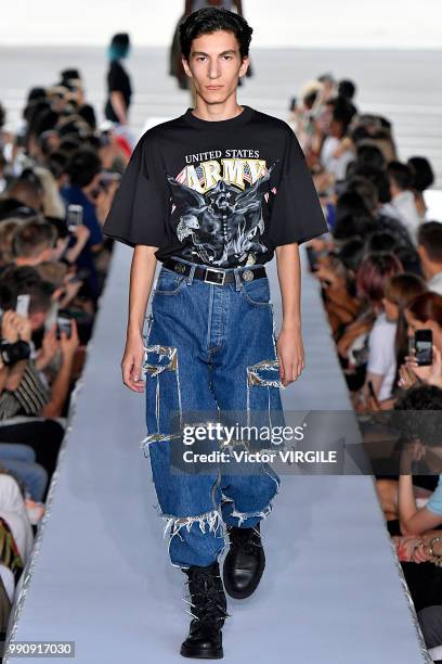 Model walks the runway during the Vetements Ready to Wear Spring/Summer 2019 fashion show as part of Paris Fashion Week on July 1, 2018 in Paris,...