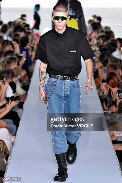 Model walks the runway during the Vetements Ready to Wear Spring/Summer 2019 fashion show as part of Paris Fashion Week on July 1, 2018 in Paris,...
