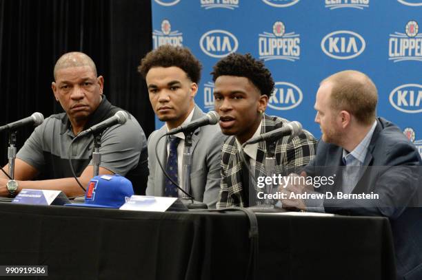 Head Coach Doc Rivers Raft Picks Jerome Robinson and Shai Gilgeous-Alexander along with Lawrence Frank look on during the Draft Press Conference at...