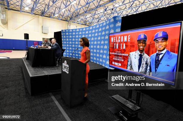 Head Coach Doc Rivers Raft Picks Jerome Robinson and Shai Gilgeous-Alexander along with Lawrence Frank look on during the Draft Press Conference at...