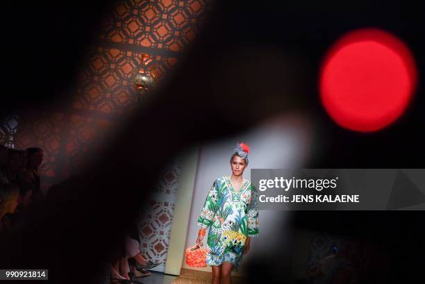 Model presents fashion of the label "Marc Cain" during the Fashion Week in Berlin on July 03, 2018. / Germany OUT