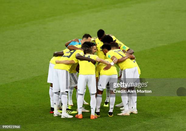 Colombia players fornm a hudde prior to during the 2018 FIFA World Cup Russia Round of 16 match between Colombia and England at Spartak Stadium on...