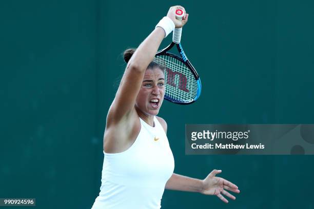 Sara Sorribes Tormo of Spain returns against Kaia Kanepi of Estonia during their Ladies' Singles first round match on day two of the Wimbledon Lawn...
