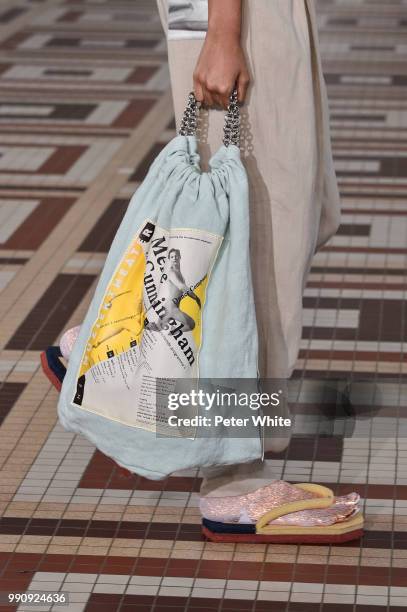 Model, bag detail, walks the runway during the Acne Studios Womenswear Spring Summer 2019 show during the Paris Fashion Week on July 1, 2018 in...